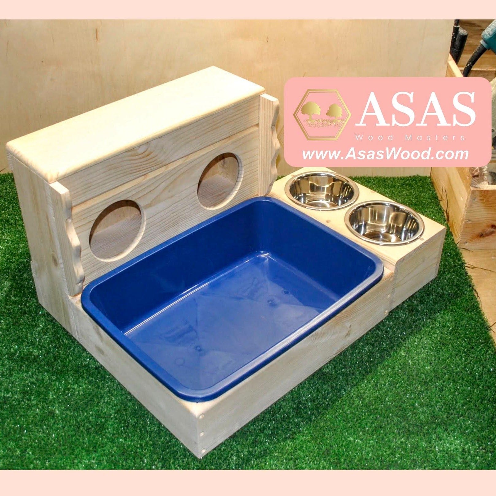rabbit hay feeder with two holes and rabbit litter box with plastic blue litter pan and food bowls station