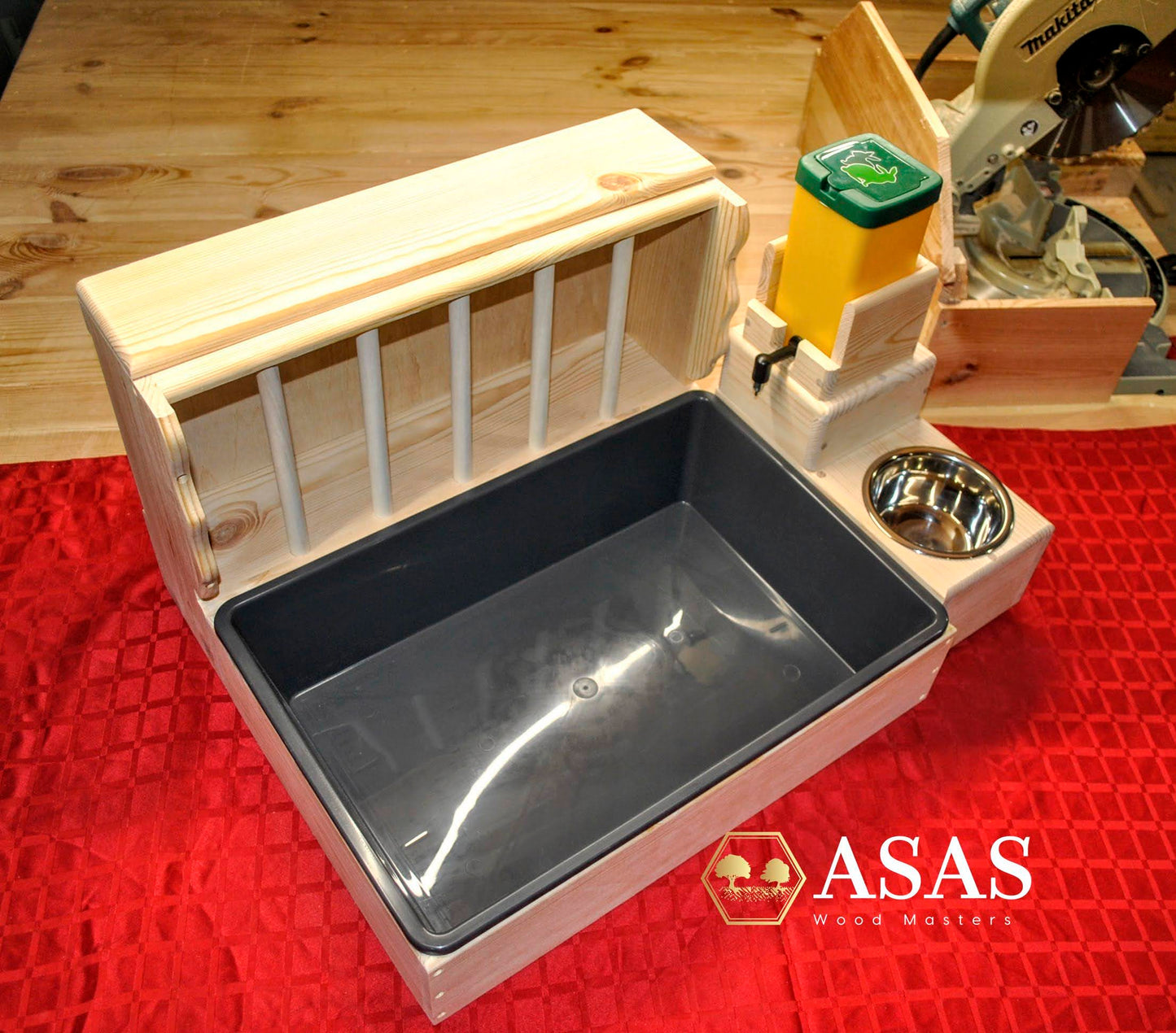 Rabbit hay feeder and water bottle, made by asaswood