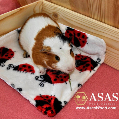 Fleece poo corner with cute baby guinea pig