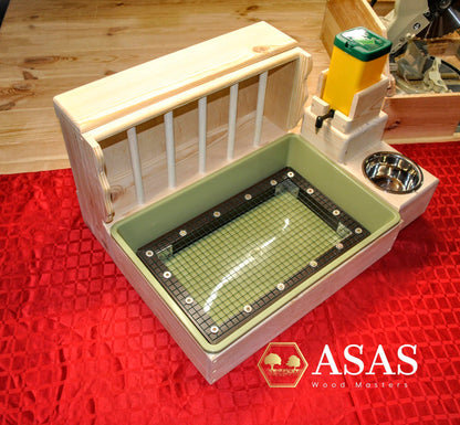 Rabbit hay feeder and water bottle, made by asaswood