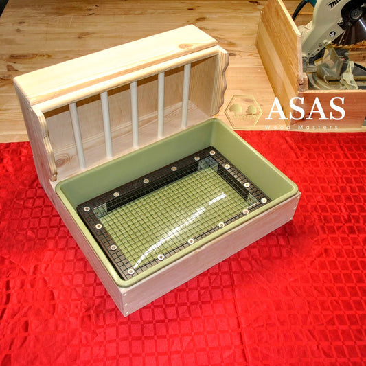 rabbit litter box, bunny hay feeder, nibble combo set up for rabbit, wire mesh insert in litter box, litter tray is green