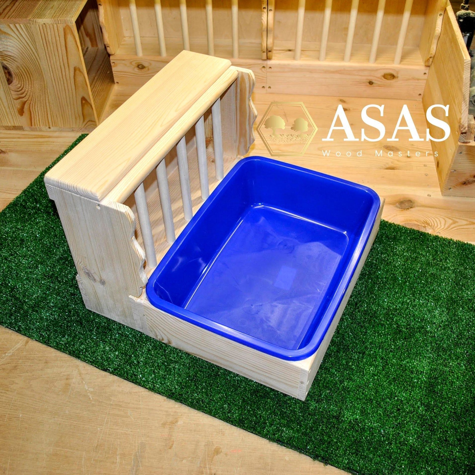 rabbit hay feeder with wooden sides to protect hay and litter box