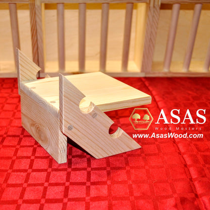 wooden stairs for guinea pig castle on red carpet